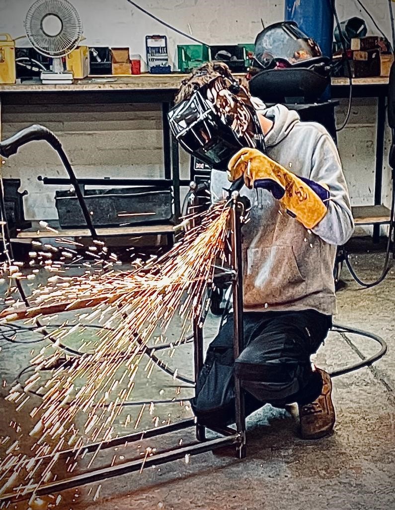 Welding a bespoke steel log store